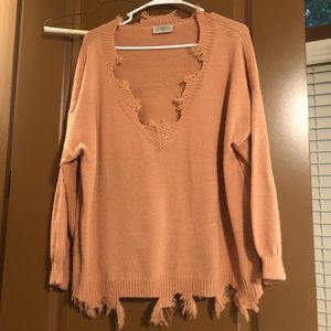 Distressed sweater